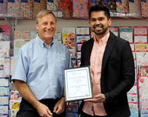 Man holding certificate