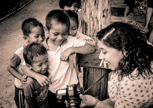 EYESeeMe charity image of children with photographer