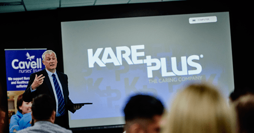 Man speaking at Kare Plus network meeting